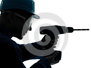 Man construction worker holding drill silhouette