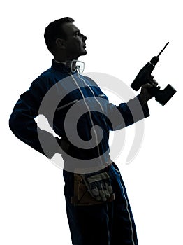 Man construction worker holding drill silhouette