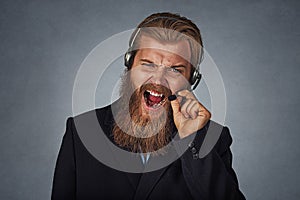 Man consultant of call center  shouting exasperated