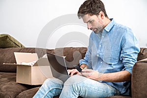 Man contact with delivery company to complain on getting wrong order