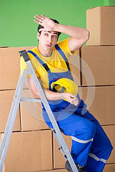 The man contractor working with boxes delivery