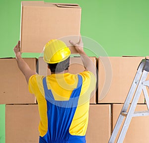 Man contractor working with boxes delivery