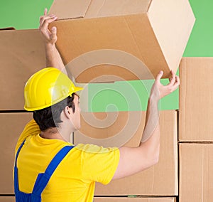 Man contractor working with boxes delivery