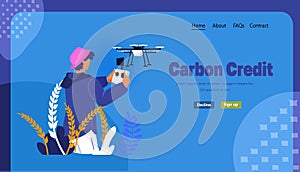 man controlling air drone with wireless remote controller carbon credit responsibility of co2 emission environmental