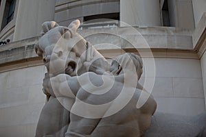 Man Controlling Trade Statue Detail