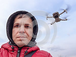 Man controls flying drone