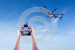 Man controls the flying drones