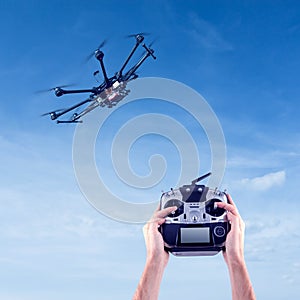 Man controls the flying drones