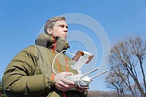 Man controls the flying drones