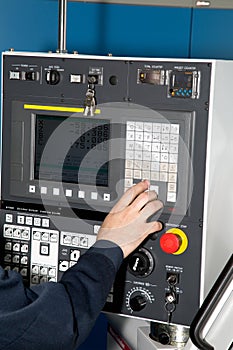 Man controls of a machine CNC