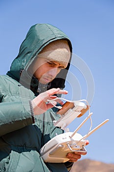 Man controls the radio-controlled drone