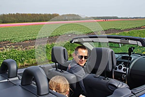 Man convertible car