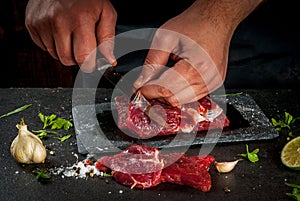 Man cooking beef meat