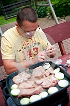 Man cooking outdoors