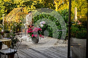 Man cooks at beautiful garden