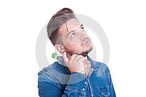 Man cooling his neck with cold water bottle