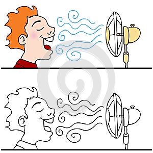 Man Cooling Off Using An Electric Fan