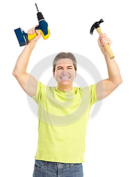 Man with cordless drill and hammer photo