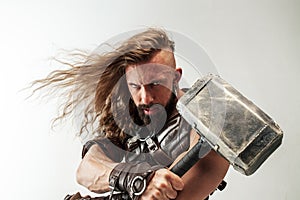 Man in cosplaying Thor isolated on white studio background
