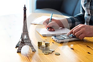 Man counting travel budget, vacation expenses or insurance cost.