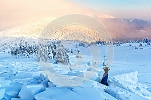 A man covered with a snow avalanche