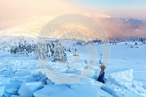 A man covered with a snow avalanche photo