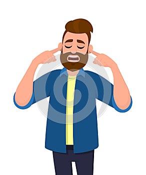 Man covering ears with fingers with annoyed expression for the noise of loud sound or music while eyes closed isolated standing. photo