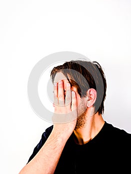 Man Covering Face with Hand - Sideview, shame, seeking anonymity, anonymous, identity