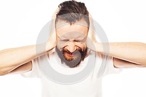 Man covering his ears by hands