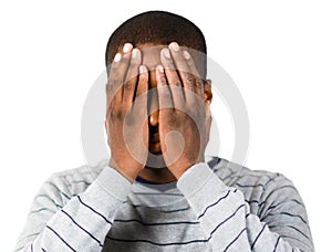 Man covering his face