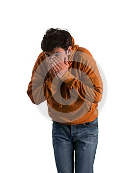 Man covering his face with hands