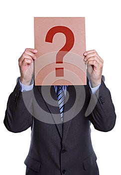 Man covering his face with a question mark sign