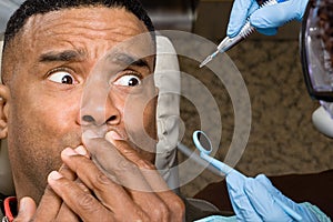 Man covering mouth