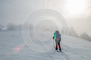 Man cross country skiing in the mountain