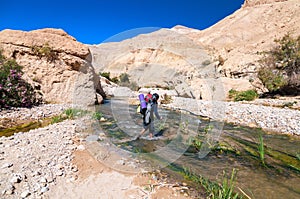 Man crossing the creek