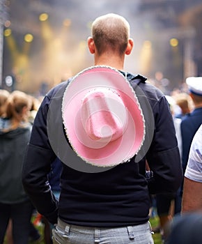 Man, crowd and music festival event audience or cowboy hat, rave outfit at party concert. Male person, back view and dj