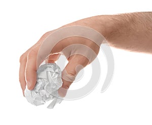 Man crumpling paper against white background, closeup.