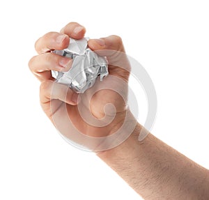 Man crumpling paper against white background, closeup.