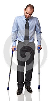 Man with crutch photo