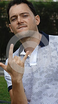 Man Cursing With Offensive Hand Gesture