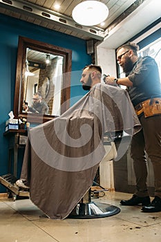 Man cut hair at barber shop free space