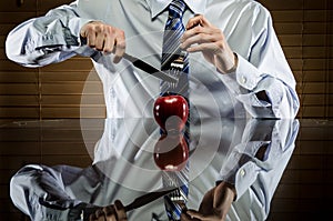 Man cutting an apple on a plate