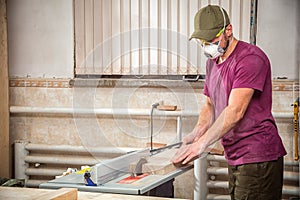 Man cutting on a circular saw