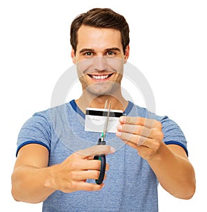 Man Cutting Credit Card With Scissor