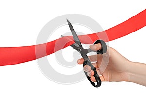 Man cutting red ribbon on white background, closeup