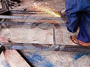 A Man is Cutting Steel Bar construction site