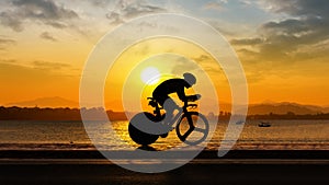 Man cycling at beach evening time
