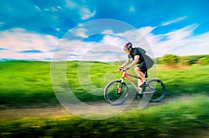 Man cycling in motion