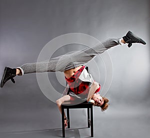 Man dancing on chair