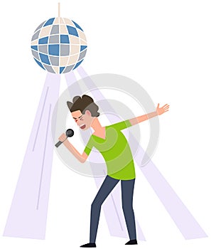 Man dancing, singing song and having fun. Guy while performing in nightclub with disco ball